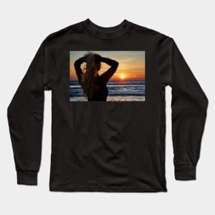 Beautiful woman on the beach at sunrise Long Sleeve T-Shirt